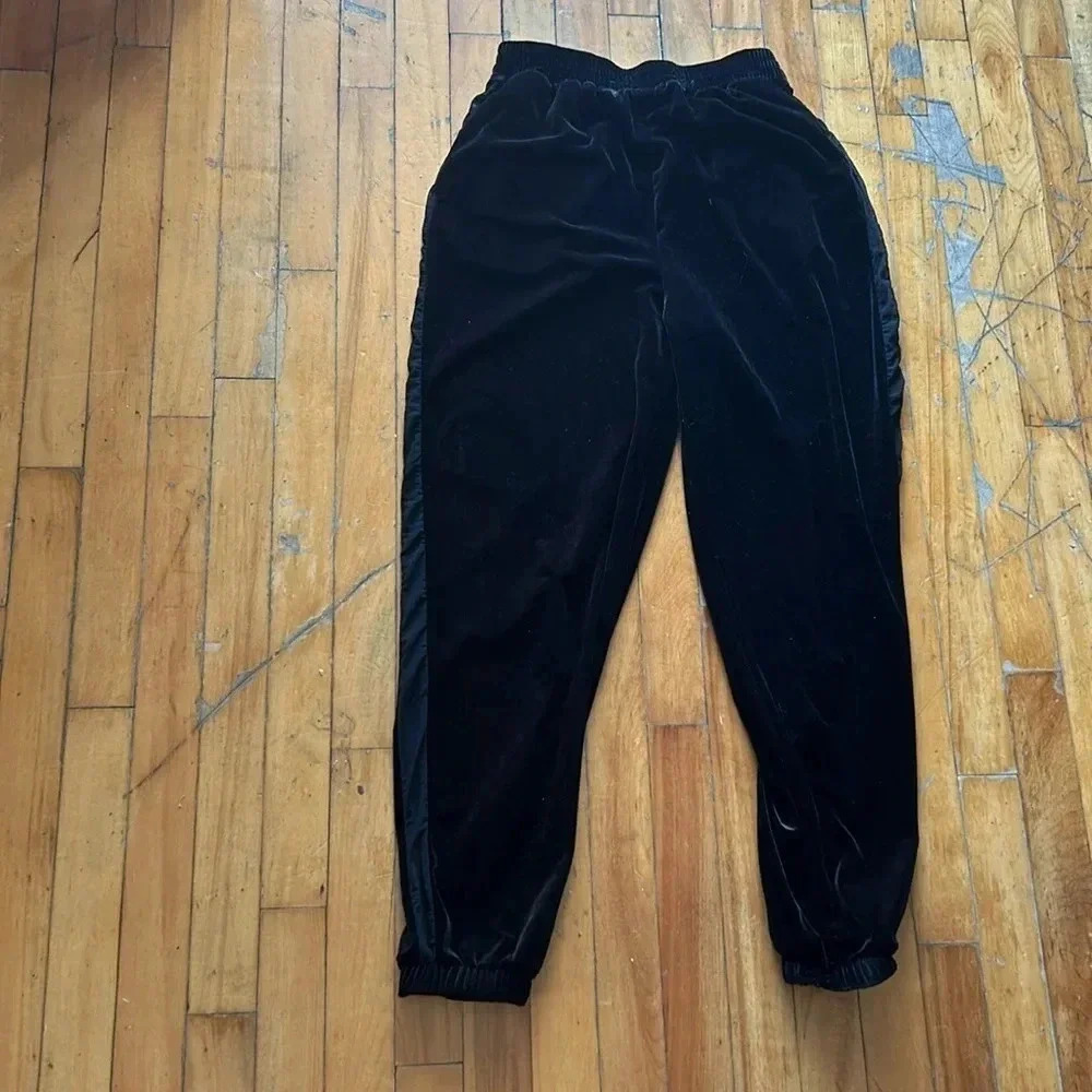 Revolve superdown black velvet joggers with mesh inserts